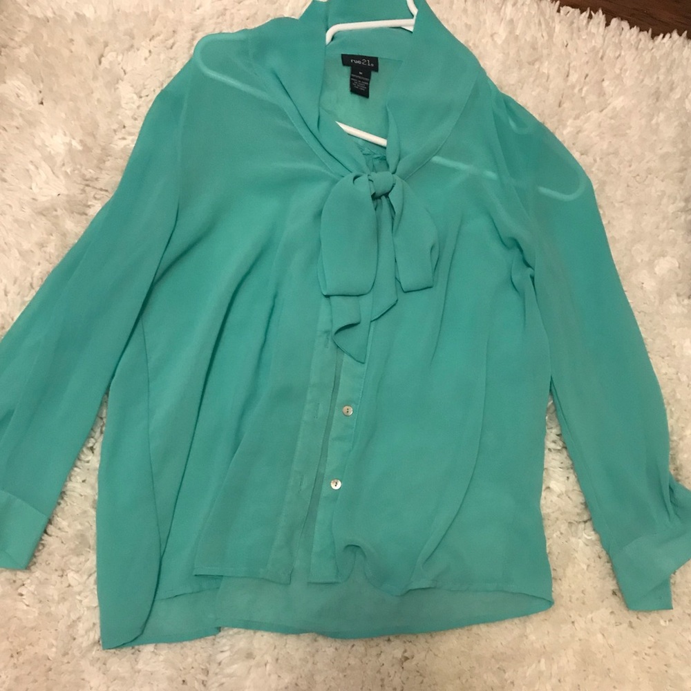 Green/blue blouse with bow in front